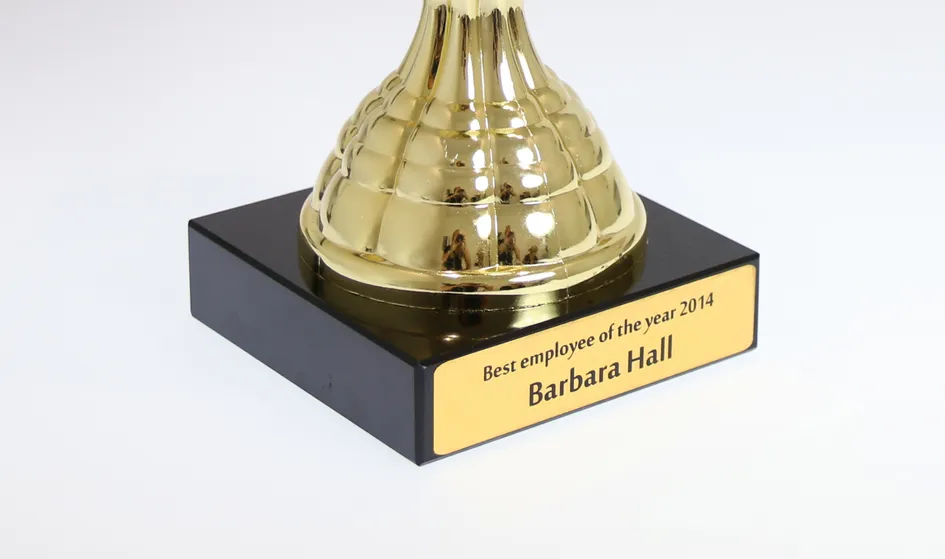 laser engraved employee award plaque on gold trophy using trotec laser marking technology